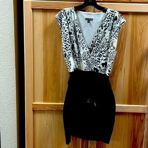 Animal print Black and white used for a wedding only worn once.